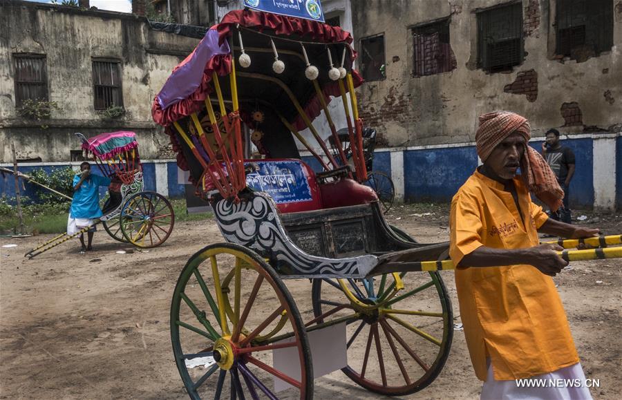 rickshaws decorated to participate in durga puja