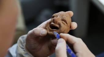 Craftsman molds Yellow River clay into vivid narratives of rural life