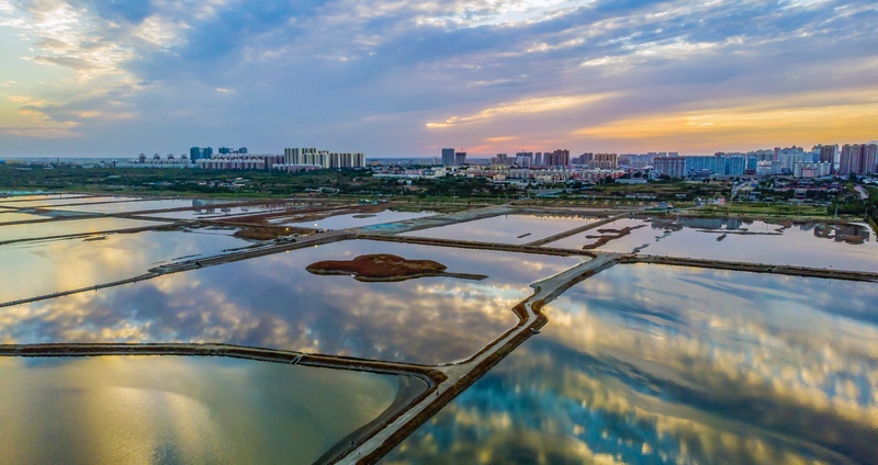 Sunset glow reflected on the surface of salt lake