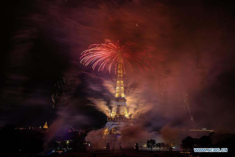 Fireworks light up sky over Eiffel Tower to celebrate Bastille Day