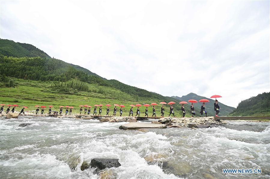 People of Zhuang ethnic group celebrate traditional diving festival in Guizhou