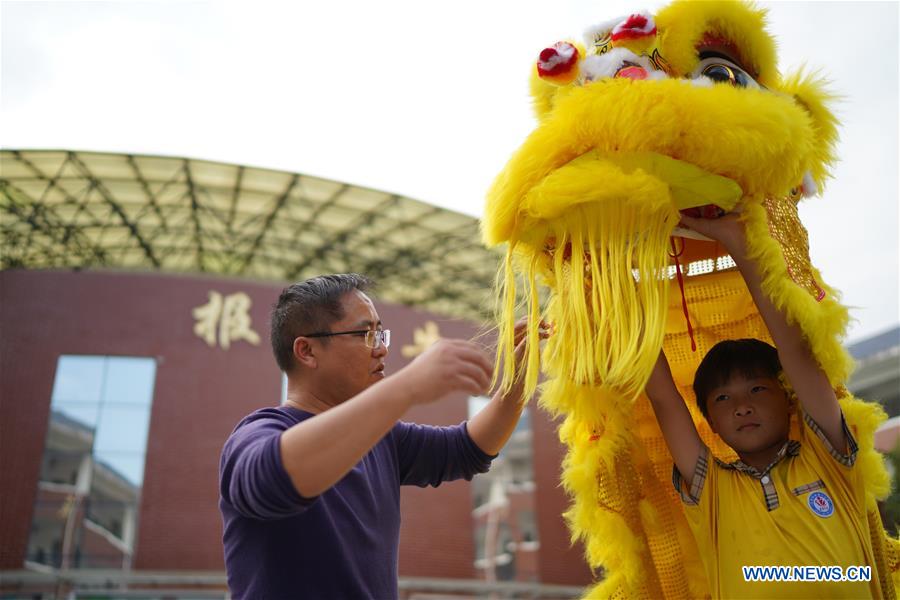 Chinese traditional lion dance taught at primary school in Jiangxi