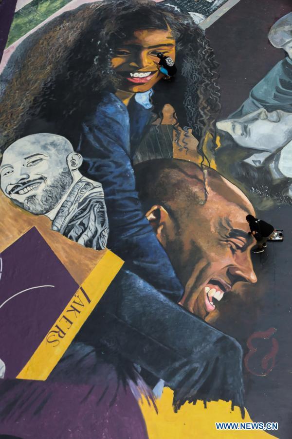 Artists paint giant mural to honor Kobe Bryant and Gianna in Manila