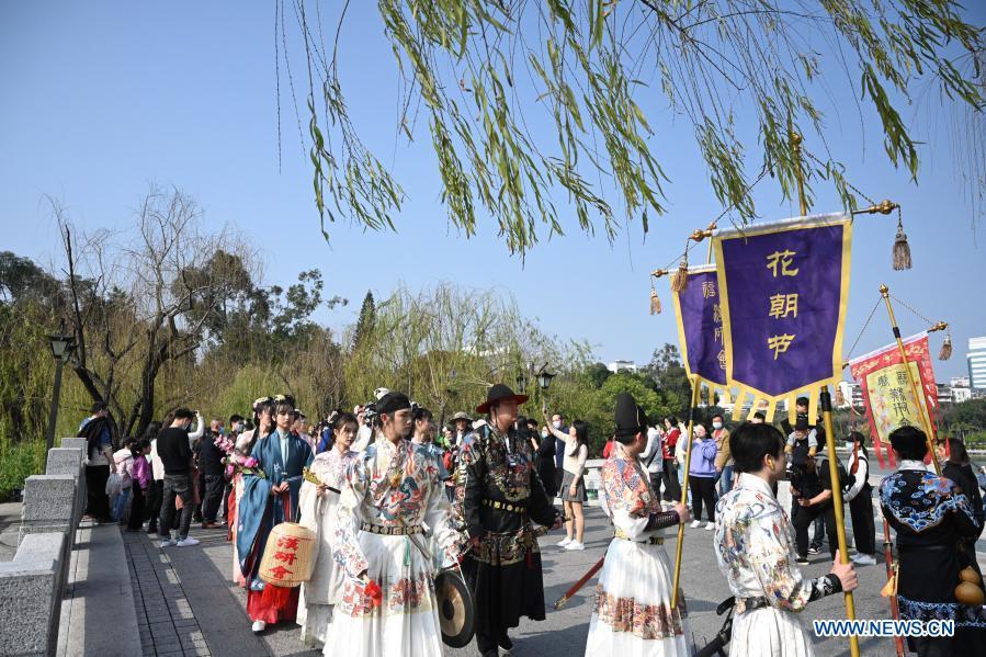 People in traditional costumes celebrate traditional Flower Festival in Fujian