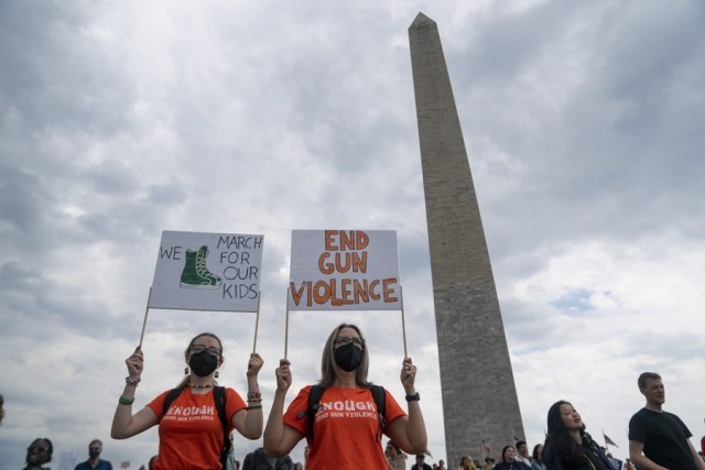 Americans decry gun violence, political inaction at nationwide rallies